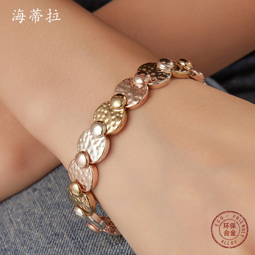 New round irregular alloy elastic bracelet, creative modeling electroplated three-color fashion women's bracelet