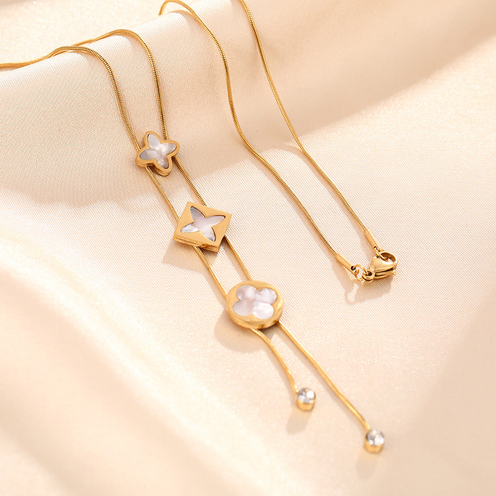 Korean version of the new temperament versatile titanium steel necklace female fringed four-leaf clover white fritillary simple niche collarbone chain jewelry