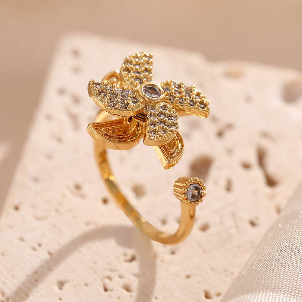 Korean version of Internet celebrity creative windmill rotating rings female niche design micro zircon opening high sense ring jewelry