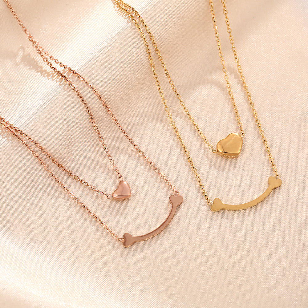 European and American cross-border hot-selling double-layer titanium steel necklace women's peach heart pendant versatile collarbone chain jewelry wholesale does not fade