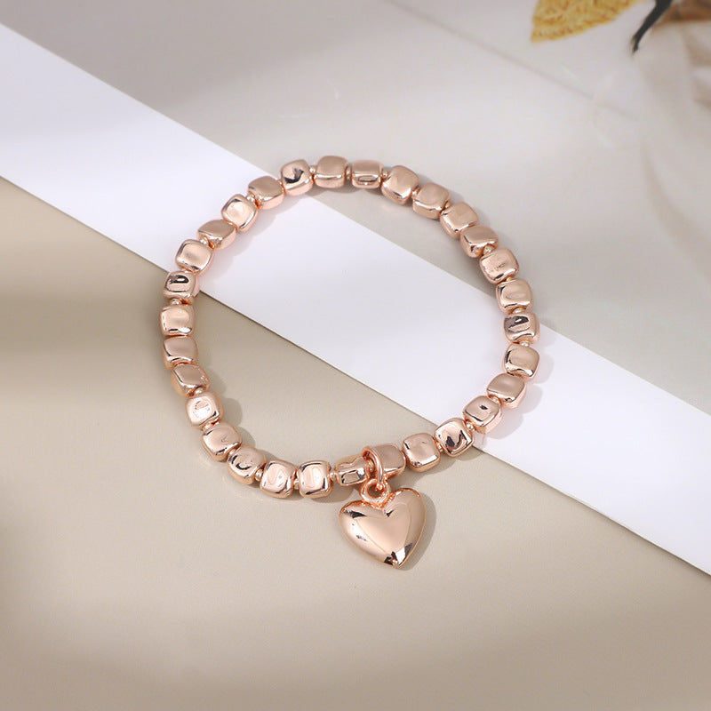 Europe and the United States hot-selling new rose gold-plated love bracelet, fashionable and environmentally friendly alloy heart-shaped pendant women's versatile bracelet