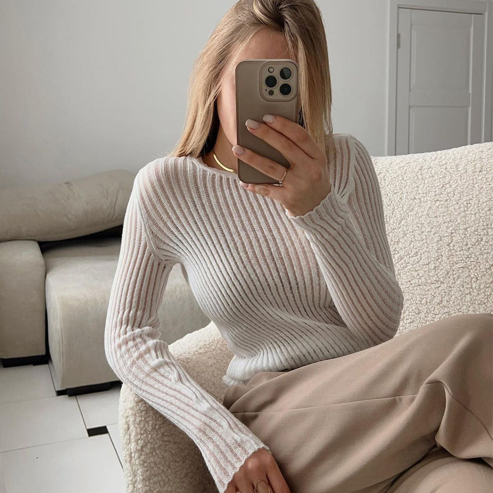Hollow knitted sweater European, American spring and summer sexy slim-fitting wool round neck long-sleeved thin pit strip knitted sweater