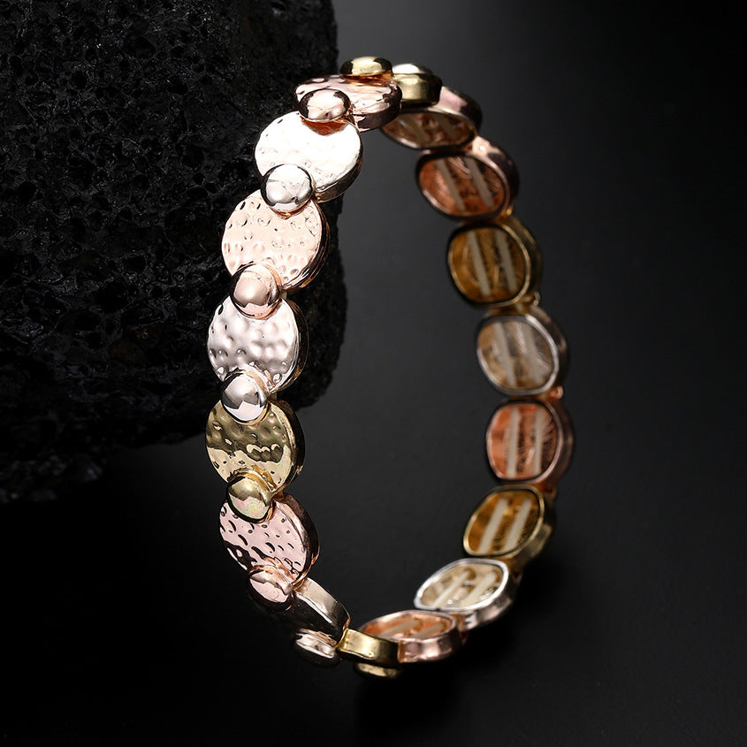 New round irregular alloy elastic bracelet, creative modeling electroplated three-color fashion women's bracelet