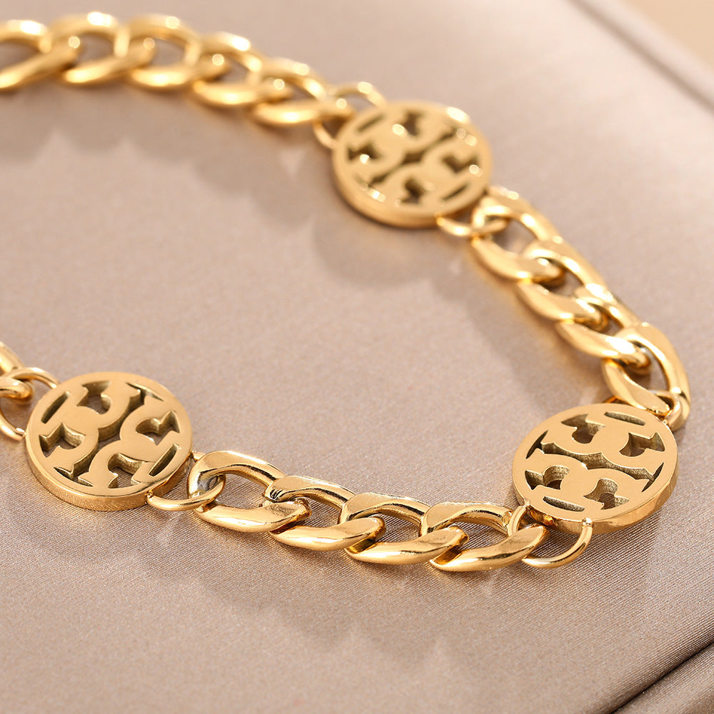 European and American fashion titanium steel bracelet simple atmosphere round hollow logo hipster light luxury niche design couple jewelry