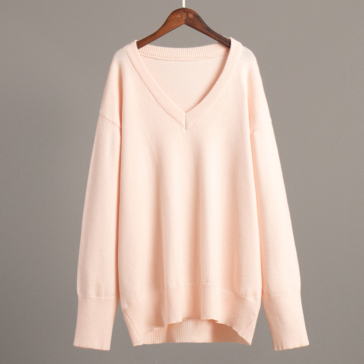 V-neck sweater women's autumn and winter European and American solid color versatile pullover sweater loose knitted sweater