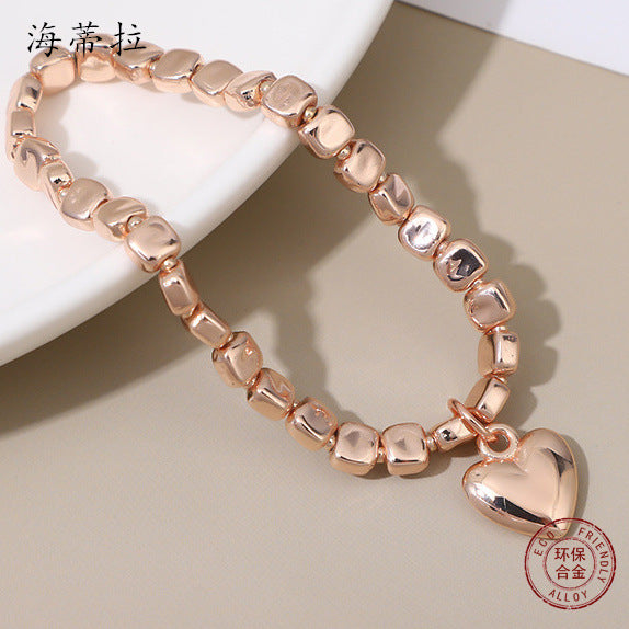 Europe and the United States hot-selling new rose gold-plated love bracelet, fashionable and environmentally friendly alloy heart-shaped pendant women's versatile bracelet