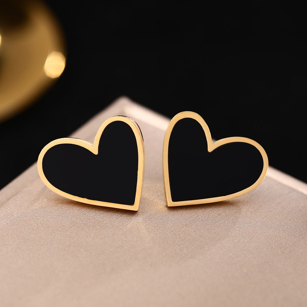 European and American personality black and white fritillary peach heart titanium steel earrings, earrings, vacuum plating 18K gold non-fading earrings, jewelry