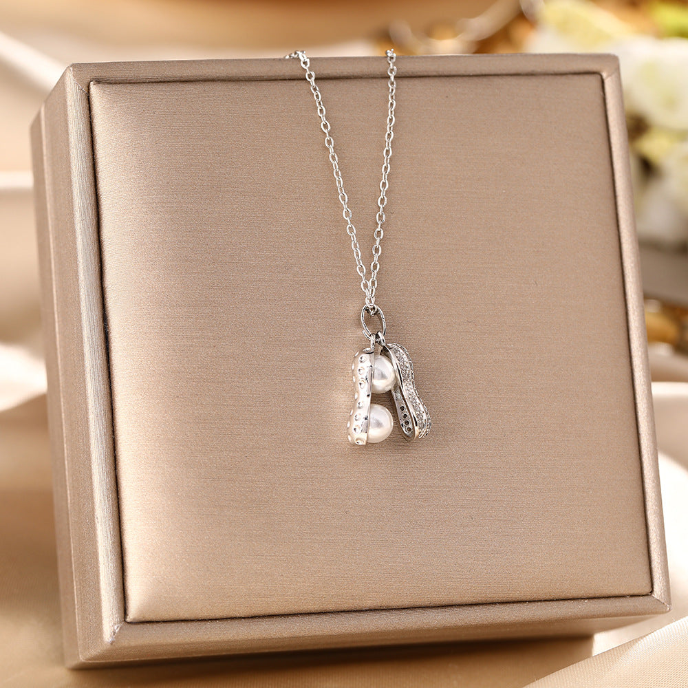Korean version of cross-border hot-selling titanium steel necklace women's niche micro-inlaid high-grade pearl peanut pendant light luxury collarbone chain jewelry