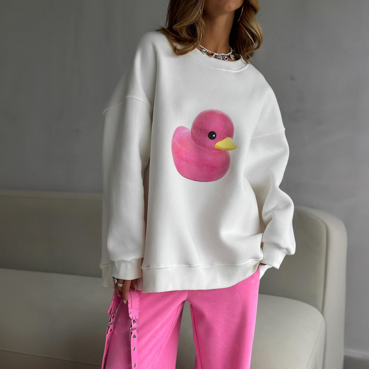 Cross-border duck crew neck sweater women's European and American autumn new women's simple casual loose crew neck printed sweater
