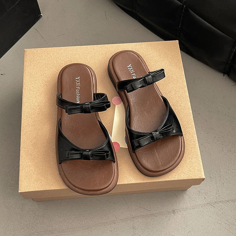 Bow flat-bottomed slippers for women's summer outer wear new fashionable versatile open-toe double with cool slippers wholesale
