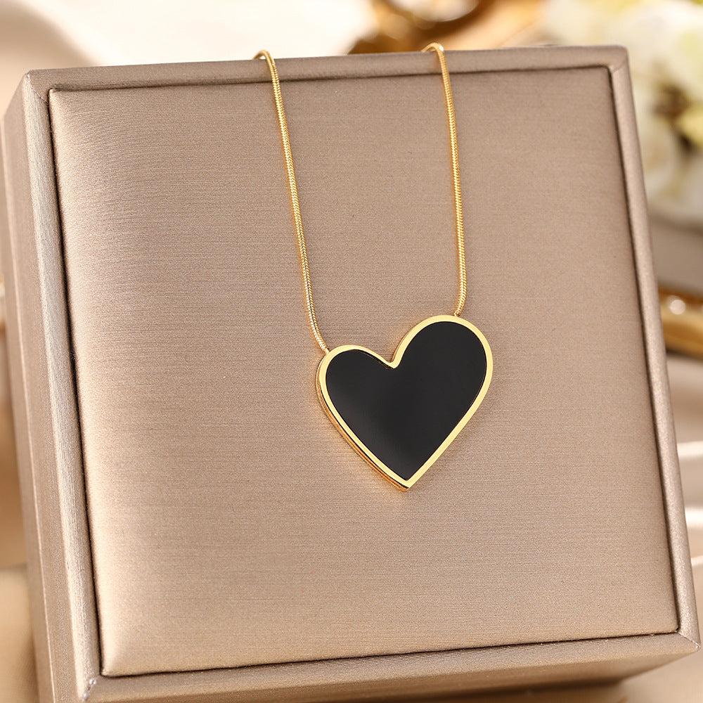 European and American personality black and white fritillary peach heart titanium steel earrings, earrings, vacuum plating 18K gold non-fading earrings, jewelry