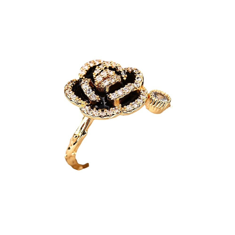 World wealth camellia black rings female ins niche high-end light luxury French small fragrant temperament hand jewelry