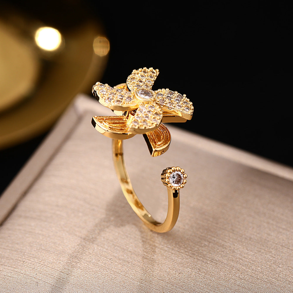 Korean version of Internet celebrity creative windmill rotating rings female niche design micro zircon opening high sense ring jewelry