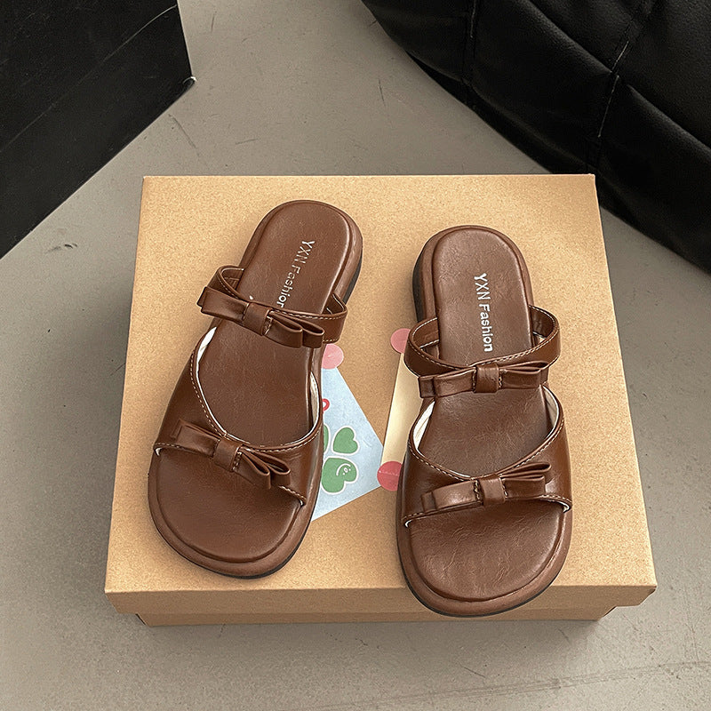 Bow flat-bottomed slippers for women's summer outer wear new fashionable versatile open-toe double with cool slippers wholesale