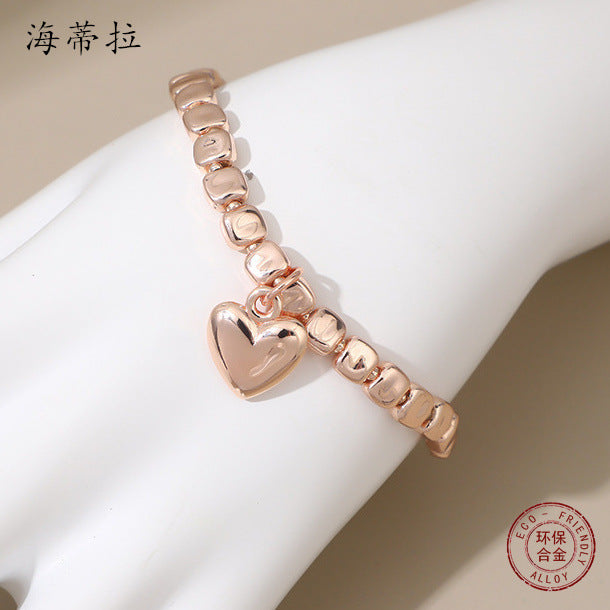 Europe and the United States hot-selling new rose gold-plated love bracelet, fashionable and environmentally friendly alloy heart-shaped pendant women's versatile bracelet