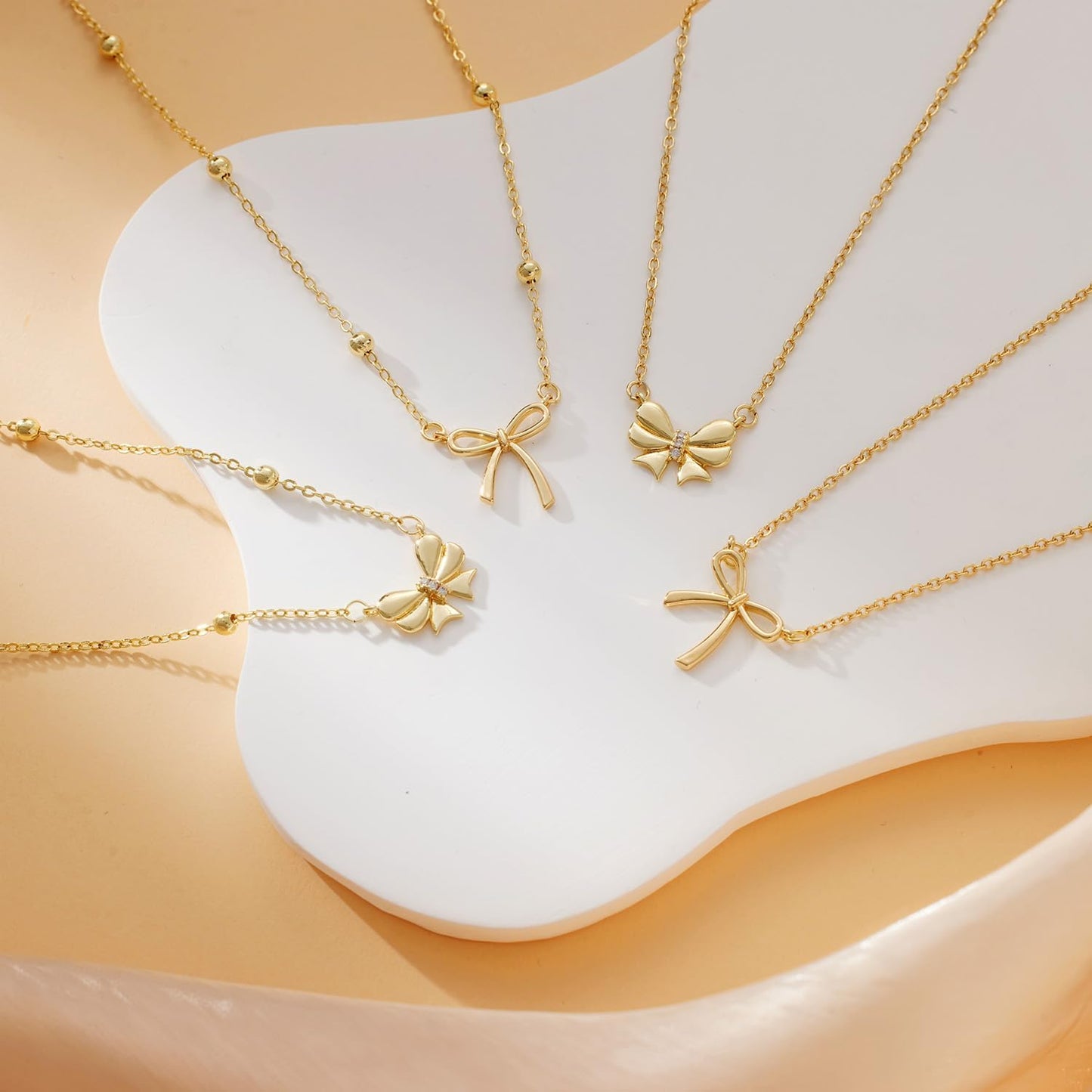 Manufacturer  Gold Necklace for Women Dainty Bow Necklace 14K Gold Plated Cute Choker Necklace Small Bow Pendant Charm Necklaces Teen Gift Trendy Stuff Personalized Jewelry Gifts  Necklace