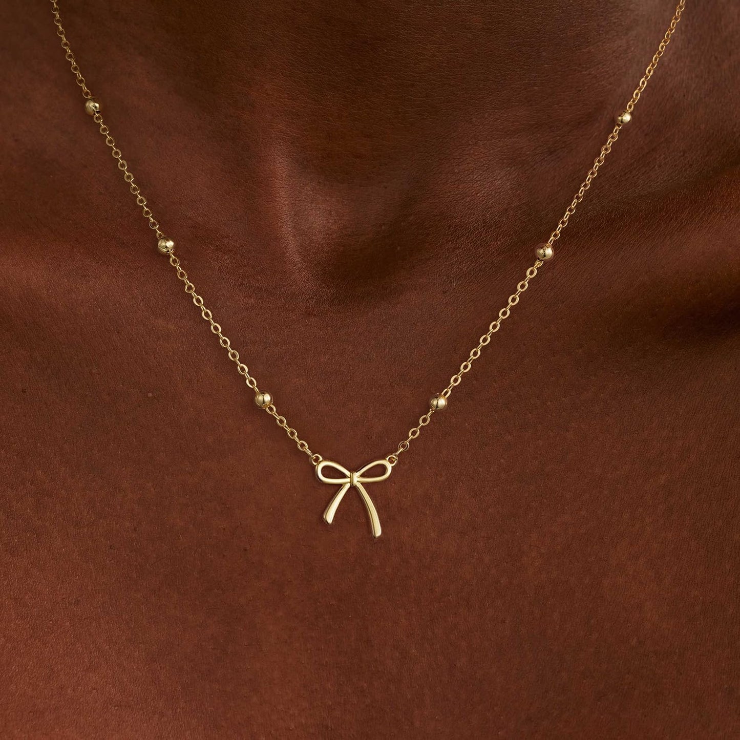 Manufacturer  Gold Necklace for Women Dainty Bow Necklace 14K Gold Plated Cute Choker Necklace Small Bow Pendant Charm Necklaces Teen Gift Trendy Stuff Personalized Jewelry Gifts  Necklace