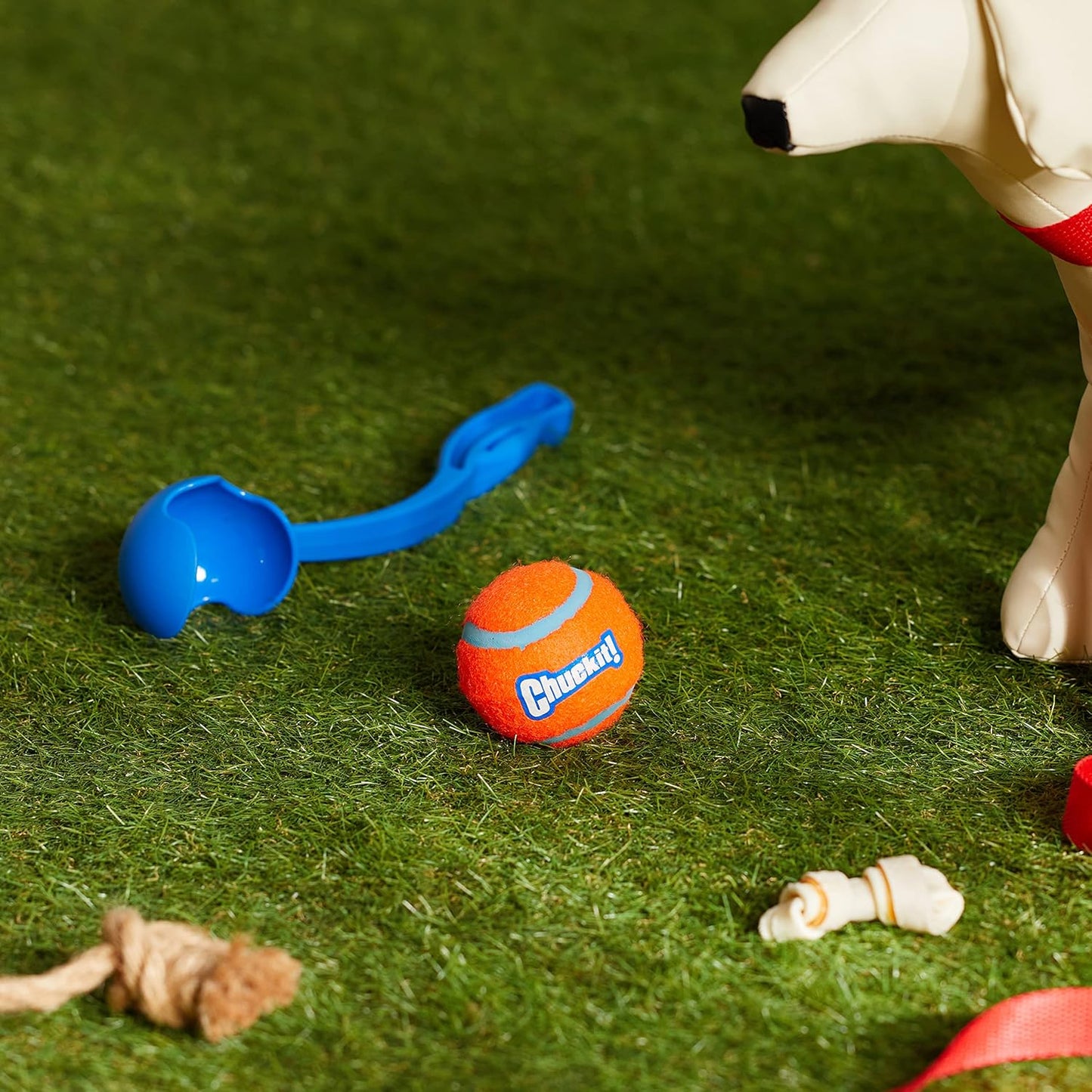 Manufacturer   Chuckit! Dog Ball Launcher - Sport 12" with Medium (2.5"), Dog Fetch Ball Thrower, For Dogs 20-60 Pounds, Made in USA    Dog toy