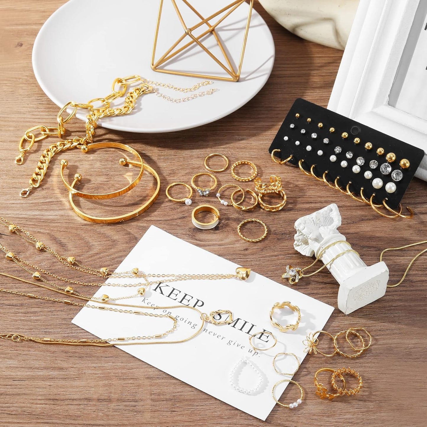 Manufacturer  IFKM 36 PC Gold Plated Jewelry Set with 4 Necklace, 11 Bracelet, 7 Ear Cuffs Earring, 14 Knuckle Rings for Women Girls Valentine Anniversary Birthday Friendship Gift  bracelets