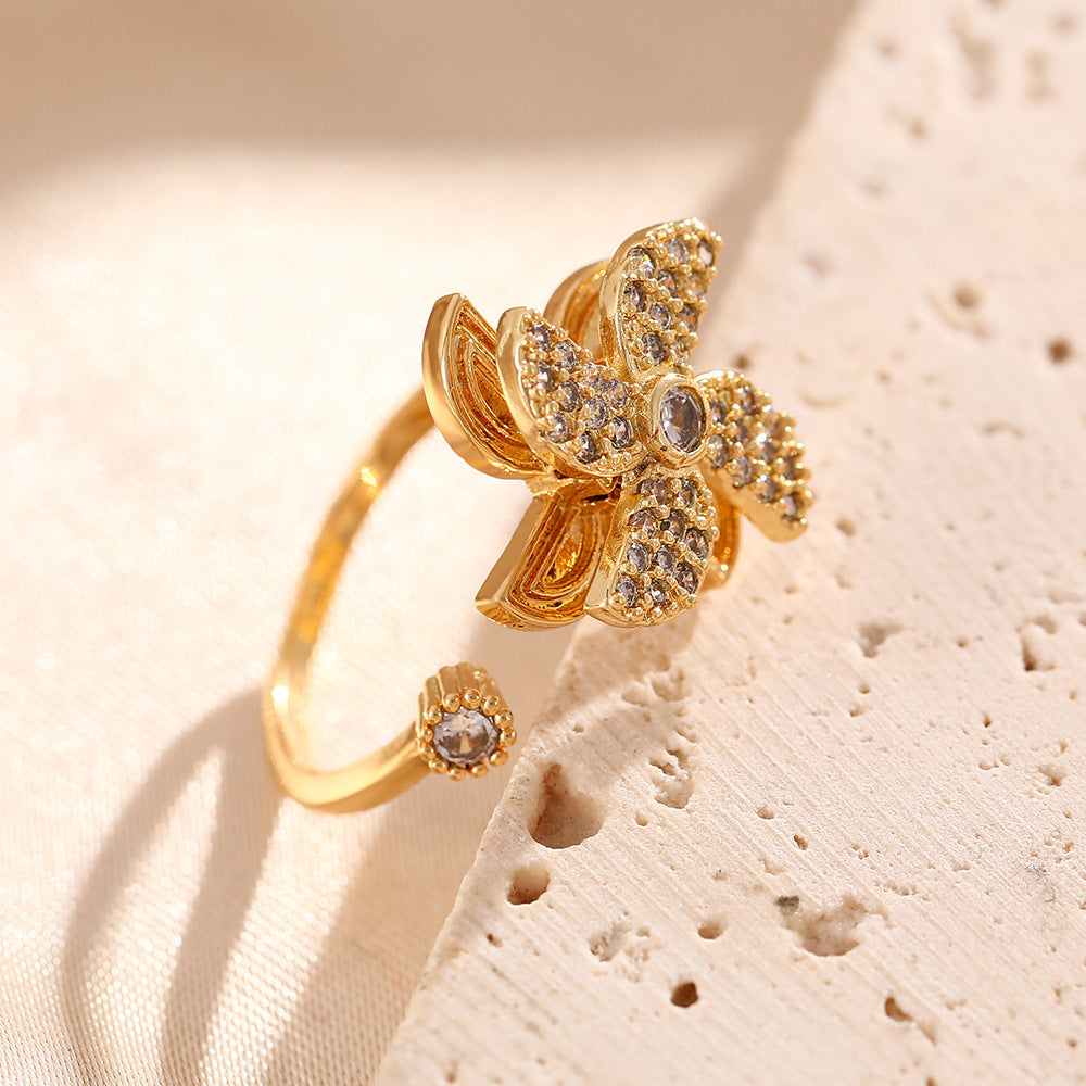 Korean version of Internet celebrity creative windmill rotating rings female niche design micro zircon opening high sense ring jewelry