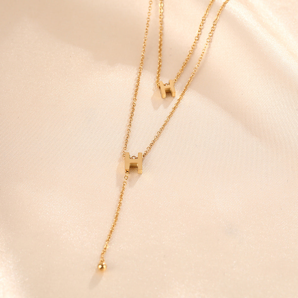 Internet celebrities with the same titanium steel fashion letter h necklace light luxury niche double-layer clavicle chain women's double H fringed versatile necklace