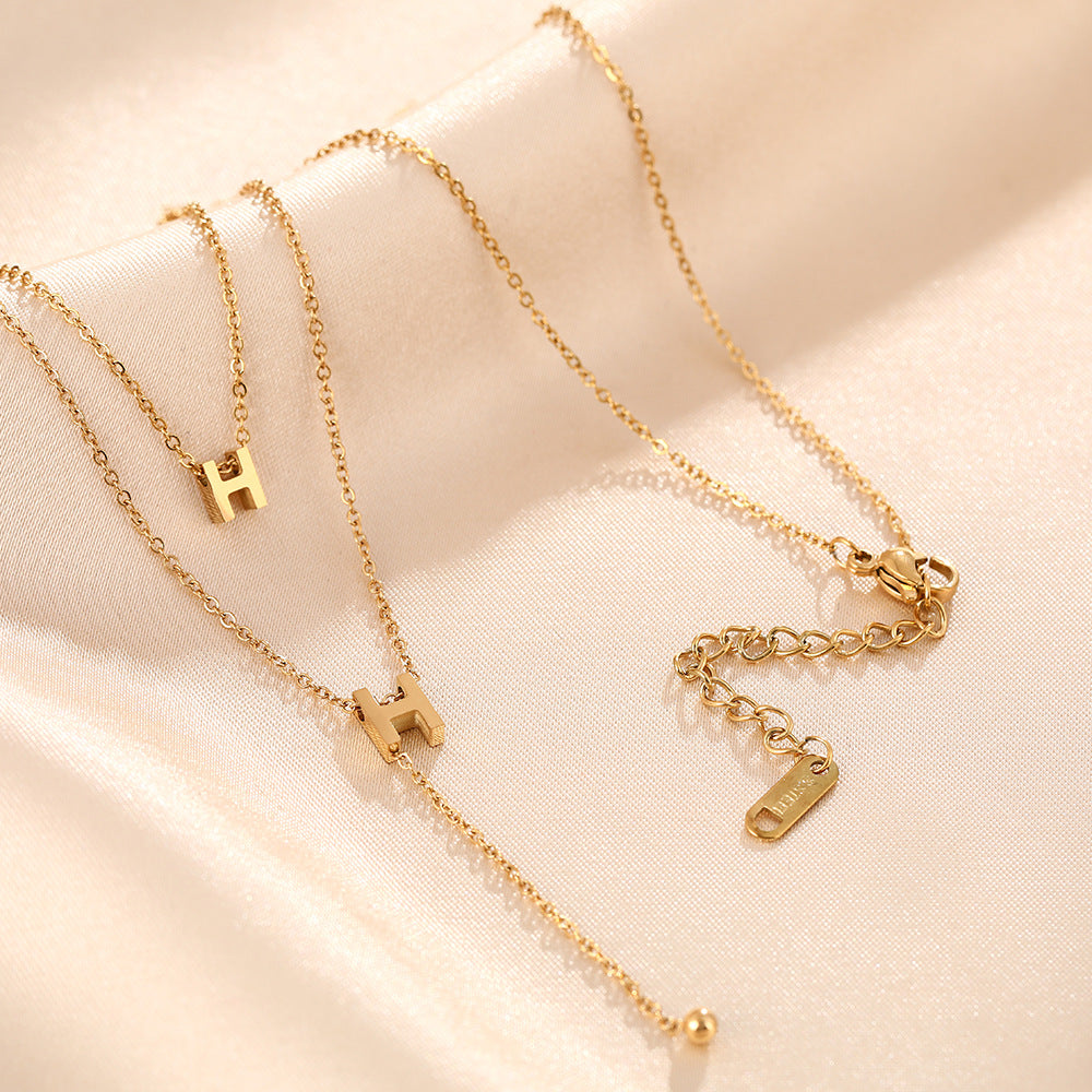 Internet celebrities with the same titanium steel fashion letter h necklace light luxury niche double-layer clavicle chain women's double H fringed versatile necklace