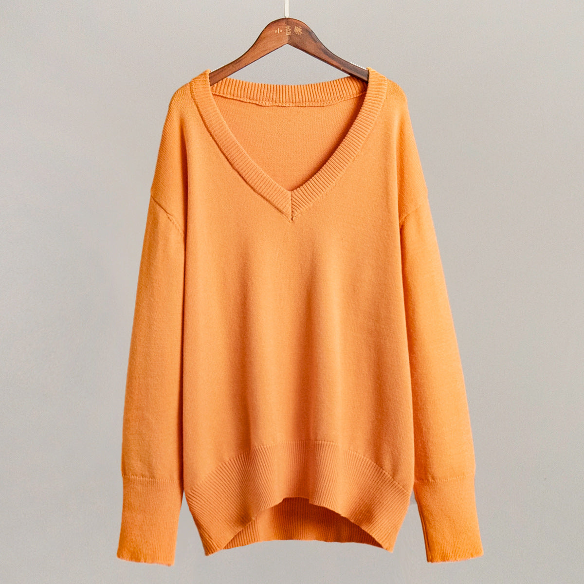 V-neck sweater women's autumn and winter European and American solid color versatile pullover sweater loose knitted sweater