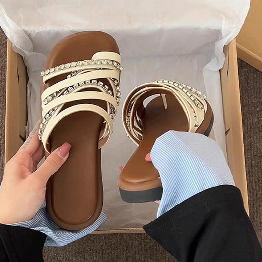 Summer new versatile flat-bottomed sandals round head non-slip temperament one-word drag fairy rhinestone cover toe slippers
