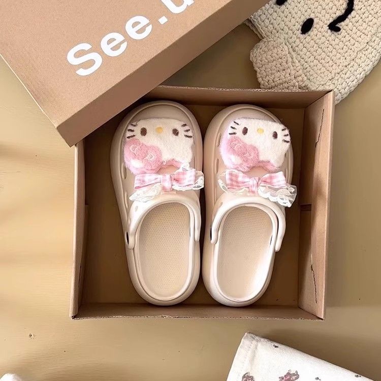 Thick-soled cartoon bag head drag women's summer niche outer wear new versatile cute hole shoes muffin bottom empty slippers