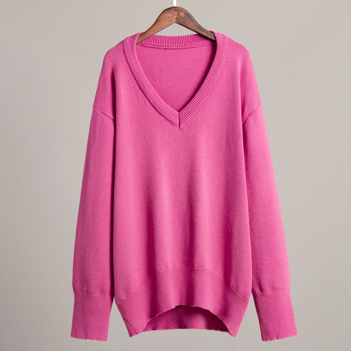 V-neck sweater women's autumn and winter European and American solid color versatile pullover sweater loose knitted sweater