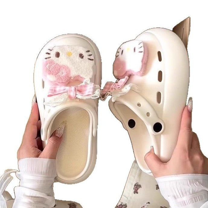 Thick-soled cartoon bag head drag women's summer niche outer wear new versatile cute hole shoes muffin bottom empty slippers