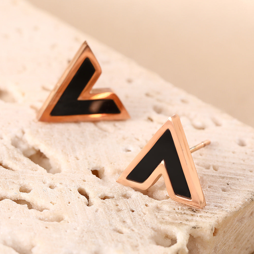 Korean version of temperament black V-shaped titanium steel stud earrings women's simple letters rose gold earrings small ear jewelry does not fade
