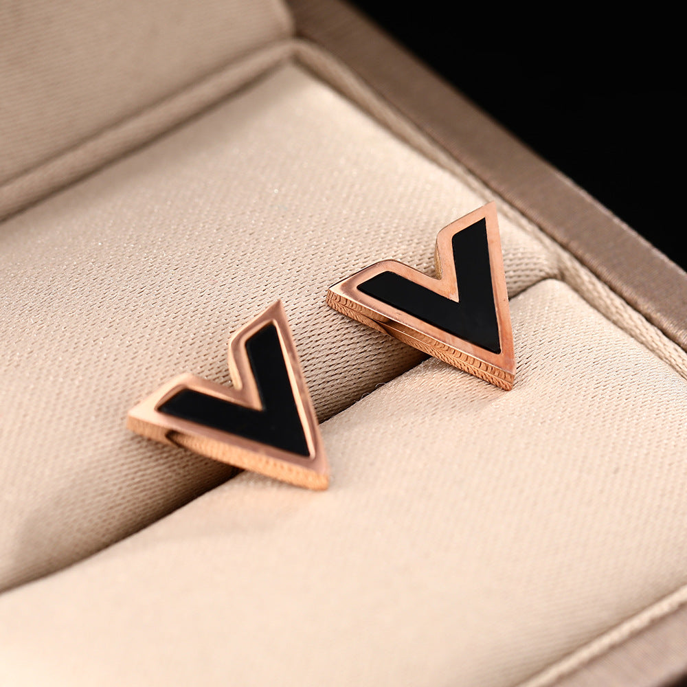 Korean version of temperament black V-shaped titanium steel stud earrings women's simple letters rose gold earrings small ear jewelry does not fade