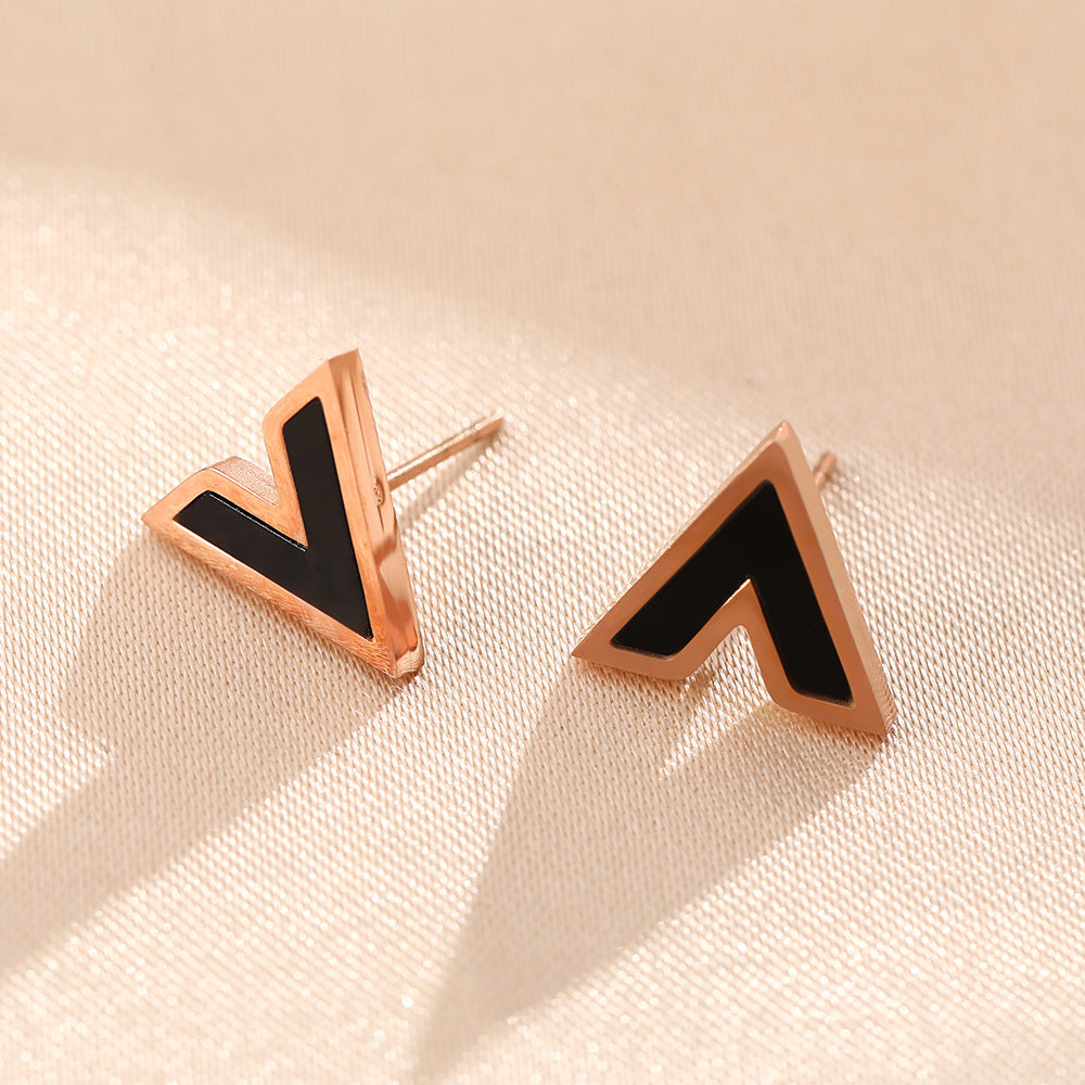 Korean version of temperament black V-shaped titanium steel stud earrings women's simple letters rose gold earrings small ear jewelry does not fade