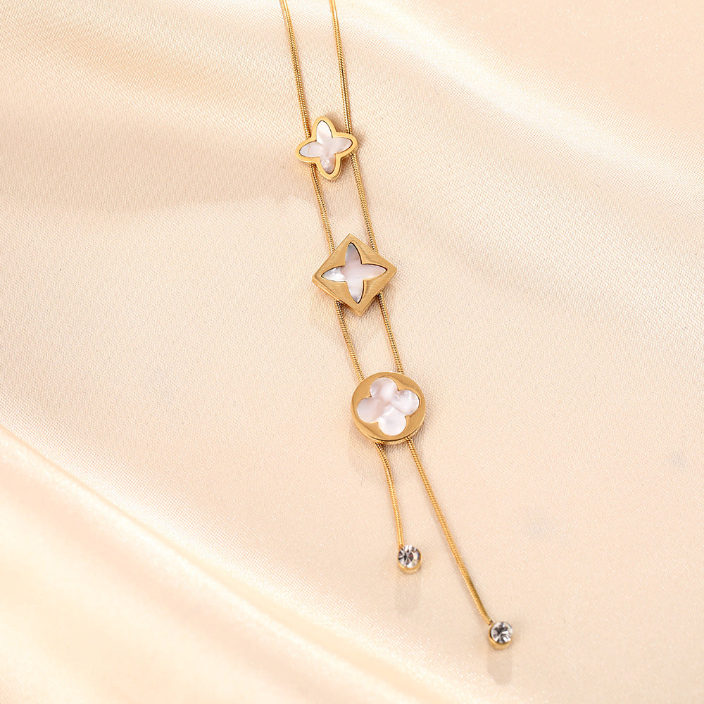Korean version of the new temperament versatile titanium steel necklace female fringed four-leaf clover white fritillary simple niche collarbone chain jewelry