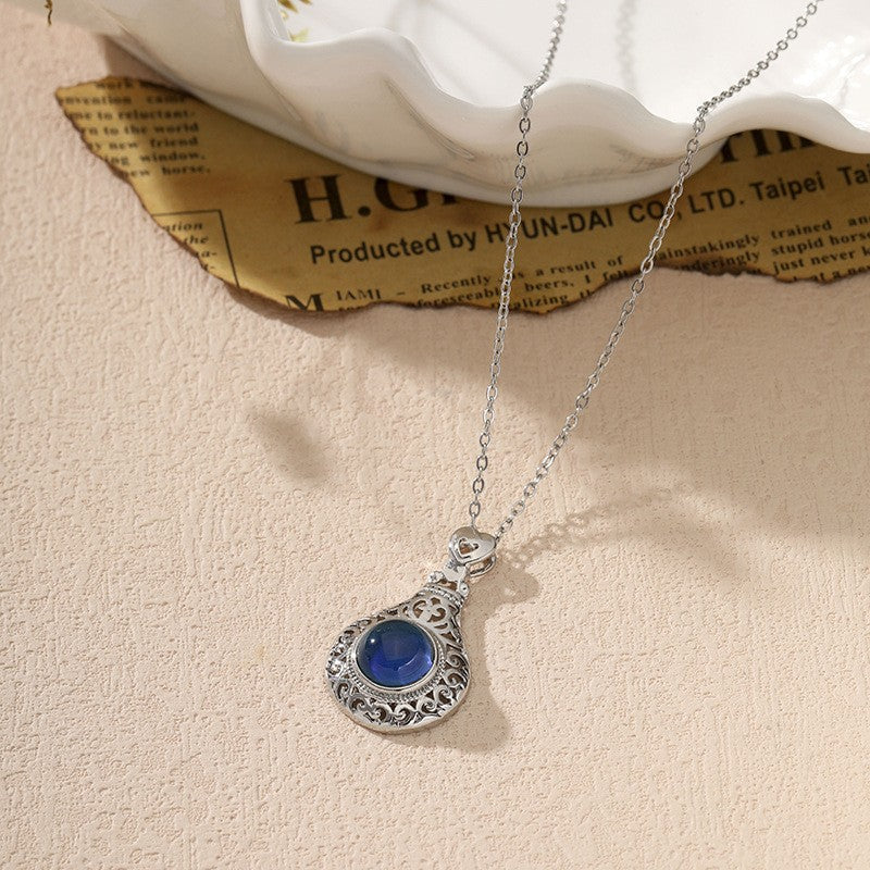 Longhe, the supply can change color, temperature sensing pendant, European and American luxury fashion hollow flower women's necklace