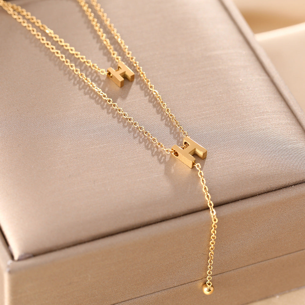 Internet celebrities with the same titanium steel fashion letter h necklace light luxury niche double-layer clavicle chain women's double H fringed versatile necklace