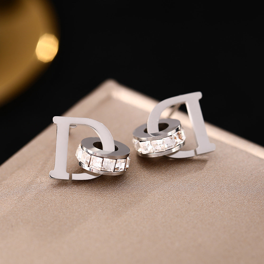 Cross-border hot-selling niche design sense light luxury letter titanium steel stud earrings femininity earrings simple ear jewelry does not fade