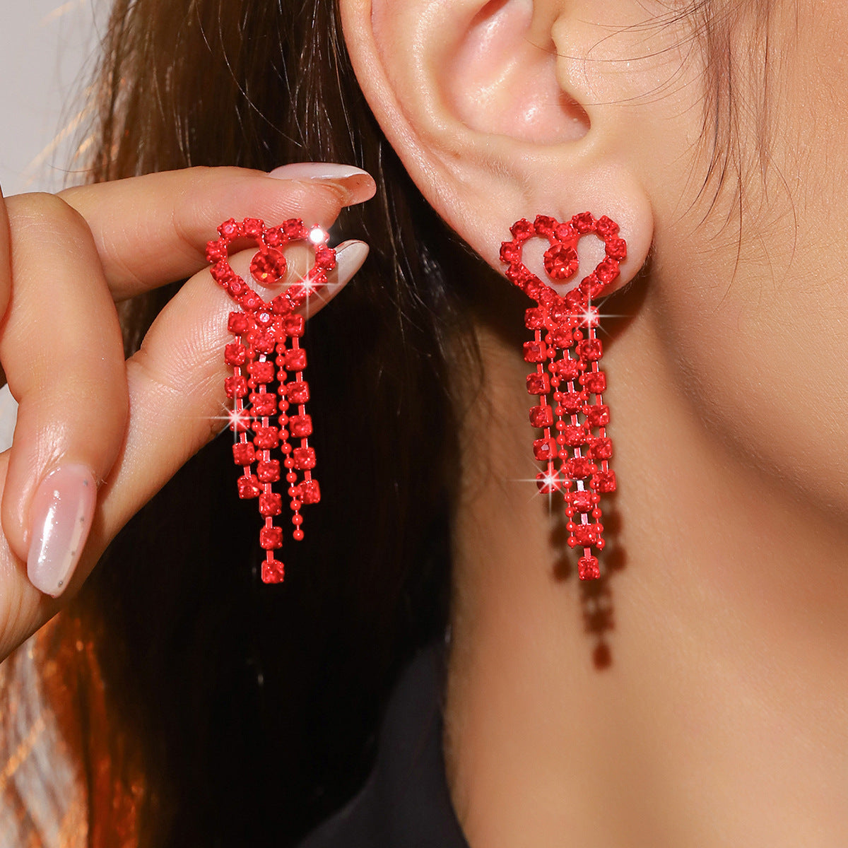 European and American fashion versatile electrophoresis big red love earrings women, high-end long peach heart flow Su stud earrings ear jewelry