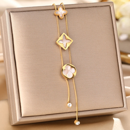 Korean version of the new temperament versatile titanium steel necklace female fringed four-leaf clover white fritillary simple niche collarbone chain jewelry