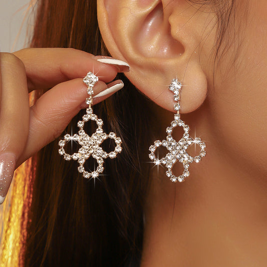 DINGKA fashionable and exquisite four-leaf clover hollow earrings for women, luxury and shiny crystal stud earrings, explosive items.