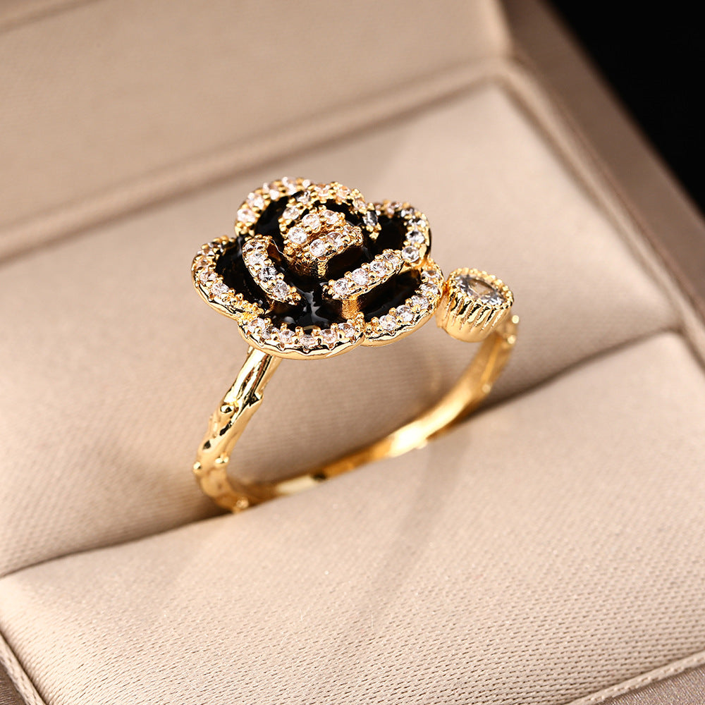 World wealth camellia black rings female ins niche high-end light luxury French small fragrant temperament hand jewelry