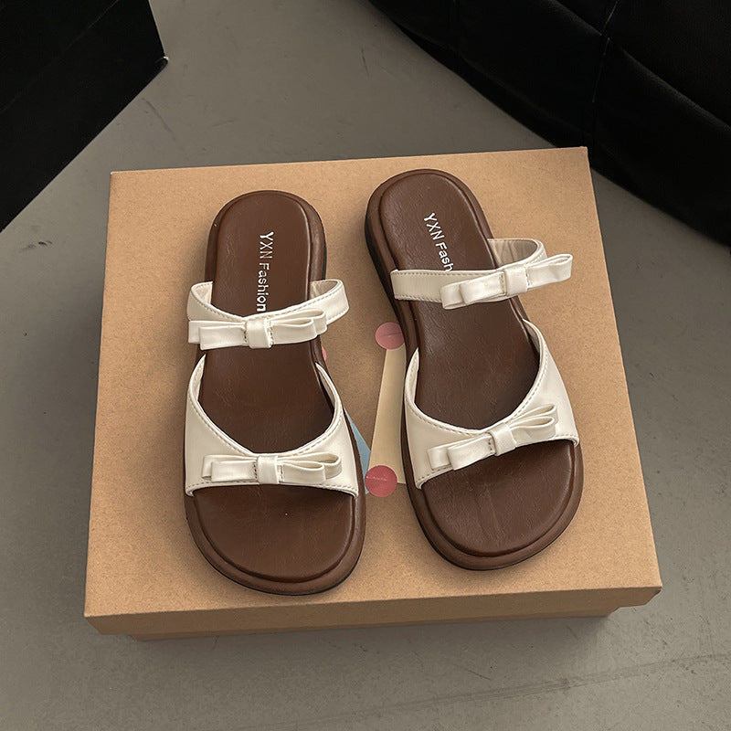 Bow flat-bottomed slippers for women's summer outer wear  new fashionable versatile open-toe double with cool slippers wholesale