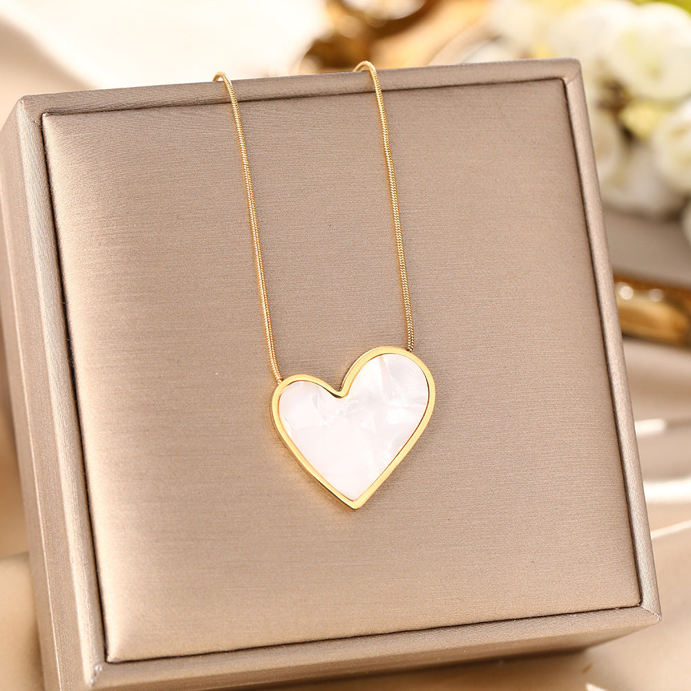 European and American personality black and white fritillary peach heart titanium steel earrings, earrings, vacuum plating 18K gold non-fading earrings, jewelry