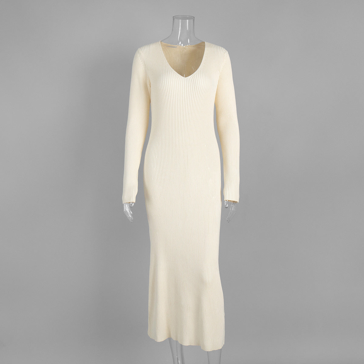 Solid color long-sleeved dress women's European, American autumn and winter new temperament V-neck slim-fitting hip-wrapped knitted long dress suits