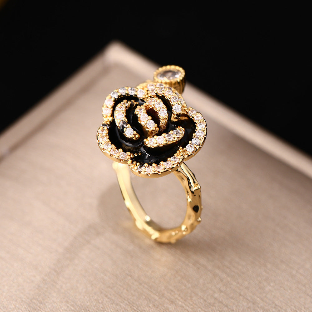 World wealth camellia black rings female ins niche high-end light luxury French small fragrant temperament hand jewelry