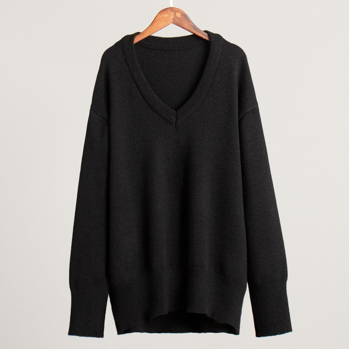 V-neck sweater women's autumn and winter European and American solid color versatile pullover sweater loose knitted sweater