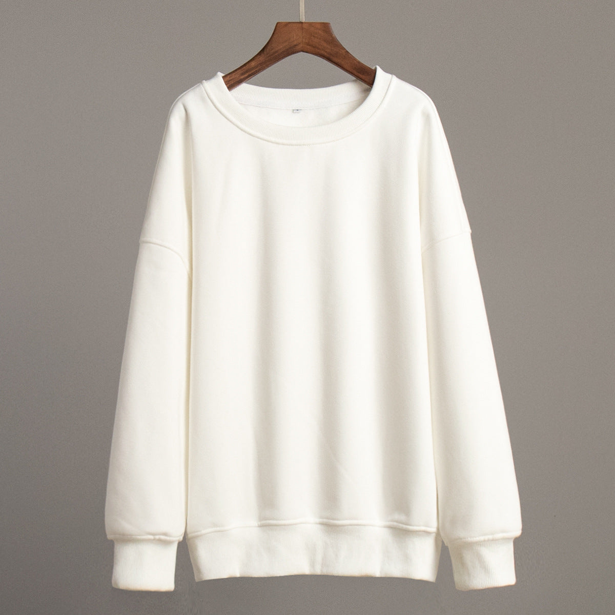 Solid color crew neck sweater European and American winter new women's fleece fleece fleece sweater casual crew neck sweater