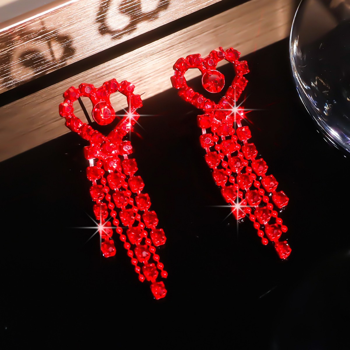 European and American fashion versatile electrophoresis big red love earrings women, high-end long peach heart flow Su stud earrings ear jewelry