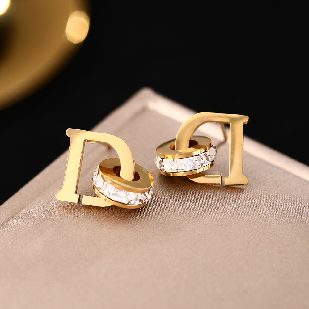 Cross-border hot-selling niche design sense light luxury letter titanium steel stud earrings femininity earrings simple ear jewelry does not fade